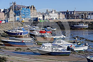 Stonehaven harbour and town at sunrise during the summer