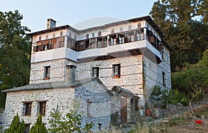 Stonemade Greek traditional tower house photo