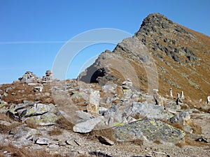 Stonemen on the trail in mountains