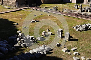 Stones of antique columns in Roman Forum, antique ruins in Rome, Italy.