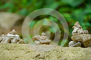 Stones are arranged in a national park near the temple for prayers