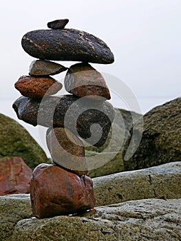 Stones balance art stacking on the beach