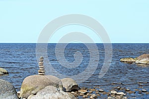 Stones balance on the beach. Place on Latvian coasts called Veczemju klintis