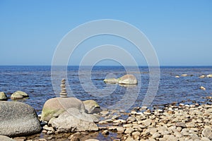 Stones balance on the beach. Place on Latvian coasts called Veczemju klintis