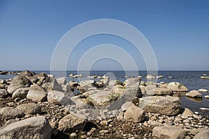 Stones balance on the beach. Place on Latvian coasts called Veczemju klintis