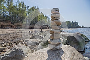 Stones balance on the beach. Place on Latvian coasts called Veczemju klintis