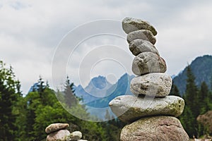 Stones balance, inspiring stability concept on rocks in mountain photo