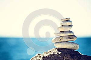 Stones balance, vintage pebbles stack background