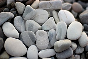 Stones on the beach, grey stones, many stones