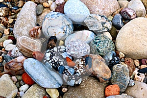 Stones on a beach in Karlovasi, Greece photo
