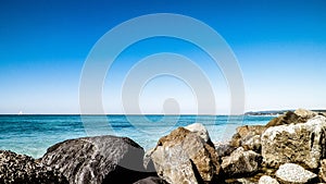 Stones on beach in Vada, Italy