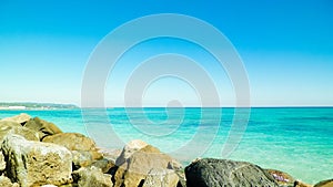 Stones on beach in Vada, Italy