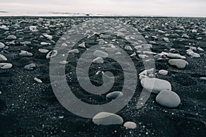 Stones on a black beach in Icelandn