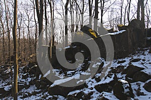 Stones built up into structure in the forest