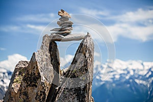 Stones cairn bridging gap near Eggishorn, Alps