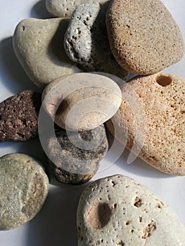Stones of different textures and colours, grouped
