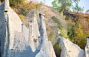 Stones lying on earth pyramids