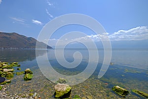 Stones & mountain by the lake in Dali-- Erhai