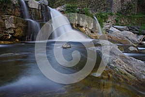 Stones reflected in the stream