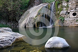 Stones reflected in the stream