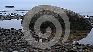 Stones at Rigas gulf shore on autumn evening