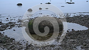 Stones at Rigas gulf shore on autumn evening