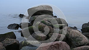 Stones at Rigas gulf shore on autumn evening