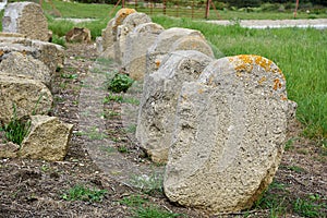 Stones, Ruins Roman in Bolonia beach photo