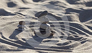 Stones on the sand background on the beach