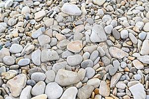 Stones on the sea. Texture of stones. Pebbles by the water. Rest on the sea.