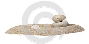 Stones and a seashell on the pile of sand