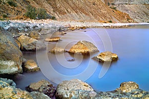 Stones at the seashore at sunset