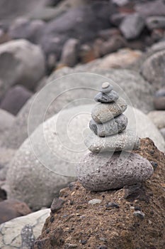 Stones stacked near the seashore