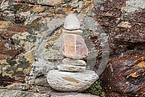 Stones stacked in a phallic shape photo
