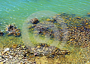 Stones and Tyrrhenian sea, natural background in Elba island