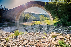 Stones under single span Renaissance bridge