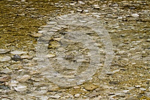 Stones under water. Blurred background