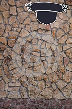 Stones wall and signboard