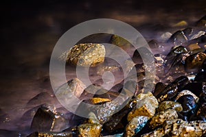 Stones On The Wavy Dreamy Soft Seashore