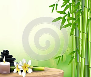 Stones, wax, flower and bamboo on the table