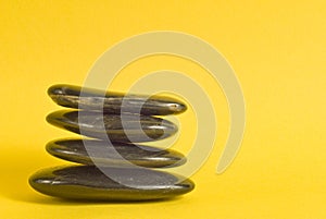 Stones On Yellow Background