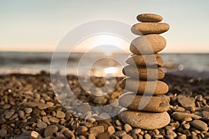 Zen basalt stones at the seaside on background