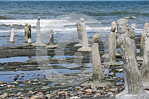 Stonework statues leading into the St. Laurence River