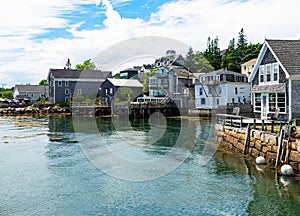 Houses by the harbor in Stonington Maine photo