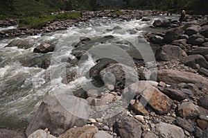 Stonny shallow river with fresh and clear water