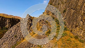 Stony basalt rocks and deep gorge, Armenia landscape, ecotourism, travel