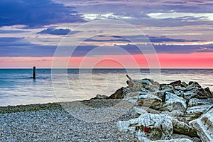 Stony coastline at sunrise