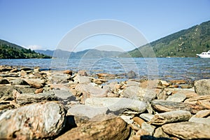 Stony foreground in picturesque Endeavour Inlet in Marlborough Sounds