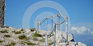 Stony road with rope fence on the peak Sv. Jure in Biokovo national park