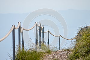 Stony road with rope fence on the peak Sv. Jure in Biokovo national park